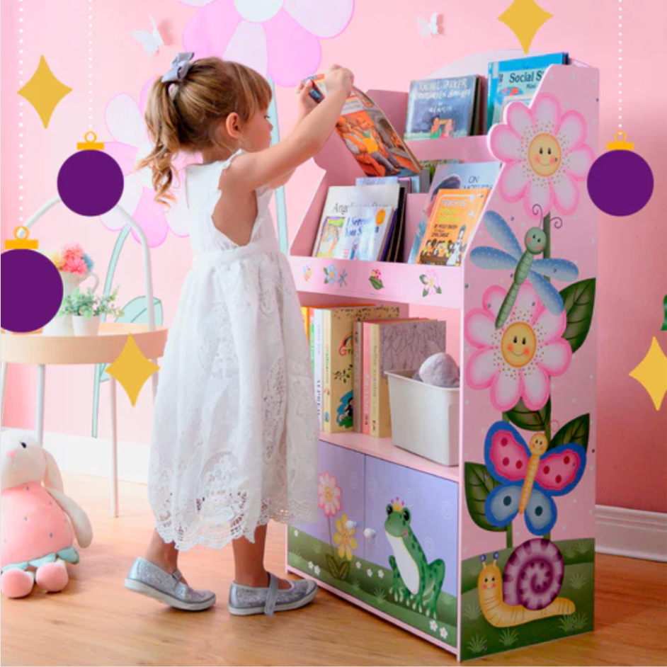 Young girl looks to pick a reading book from her teamson bookcase.
