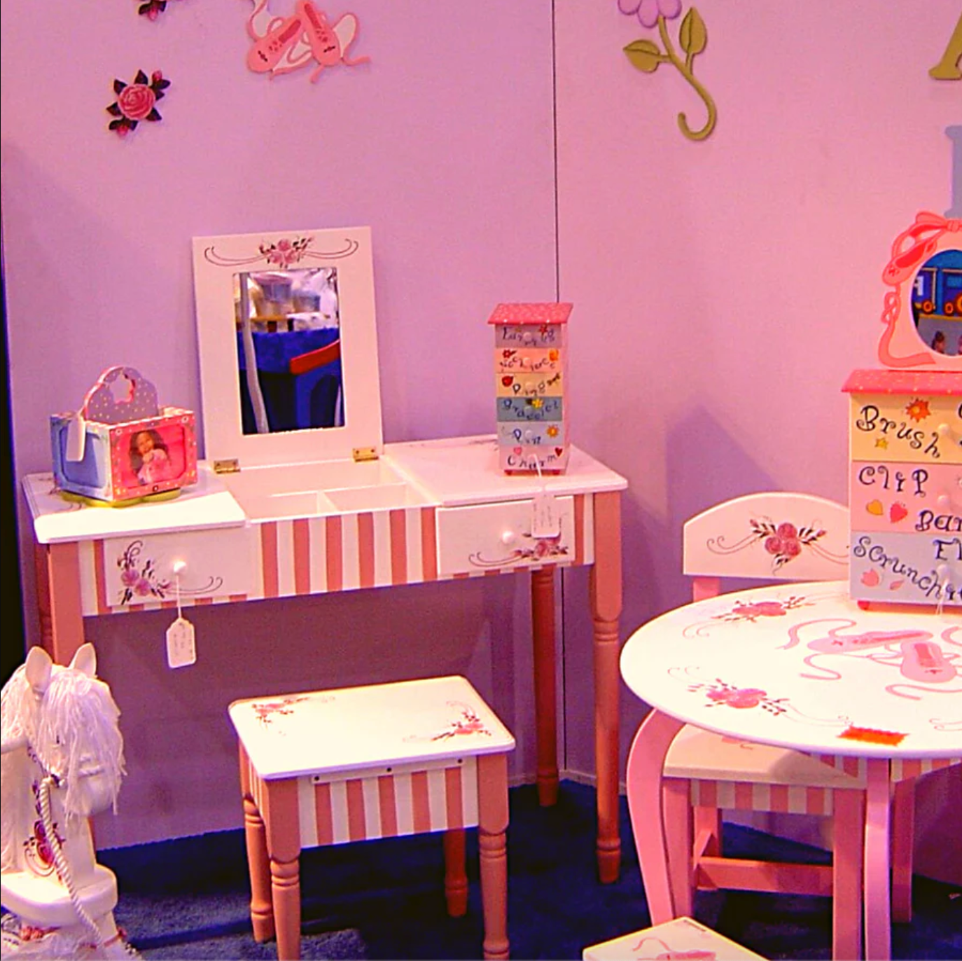 Kids room decorated with older teamson products.