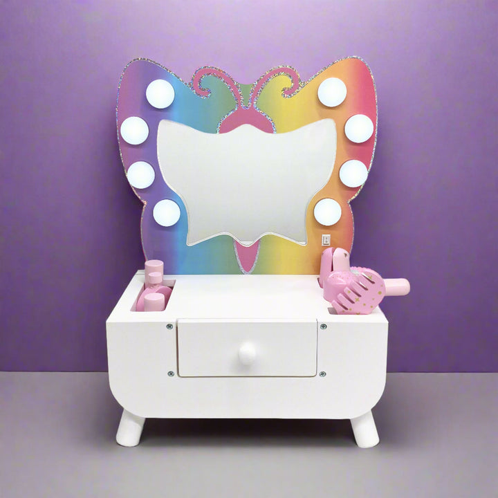 Butterfly vanity with makeup sitting on a desk in a purple room.