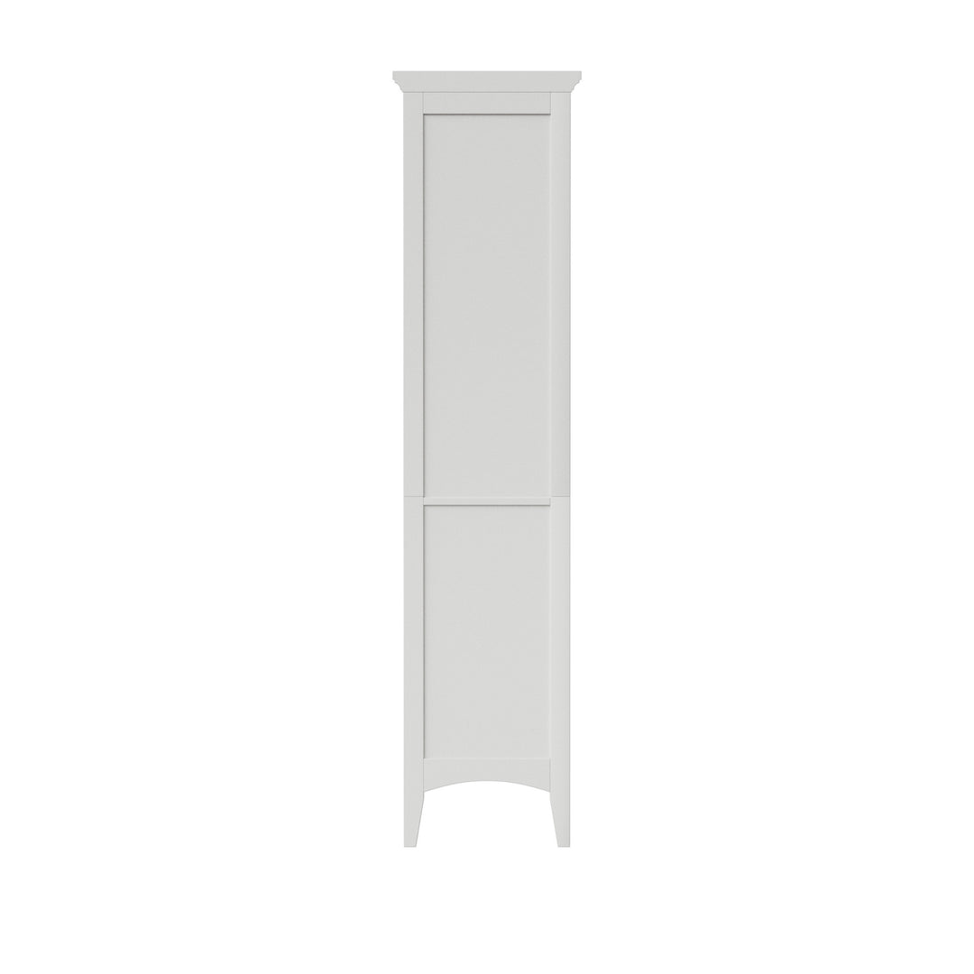 Back view of a tall white linen cabinet