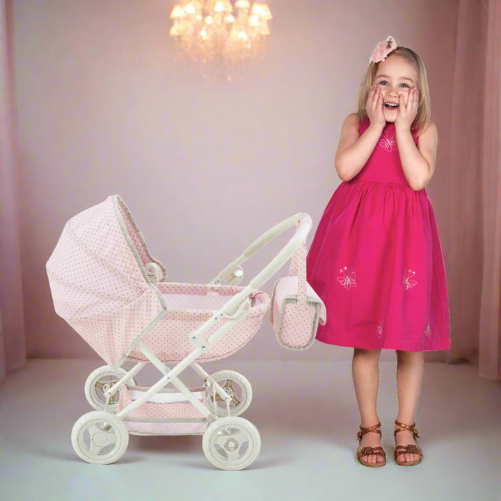 stroller next to a happily surprised girl role playing as mom in a chic play room