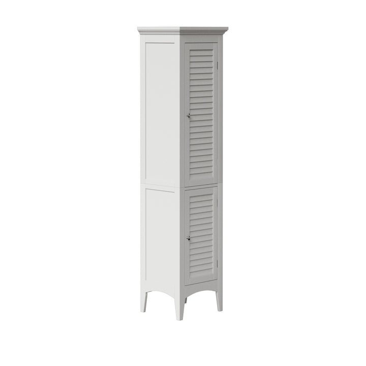 Side view of a tall whilte linen caibinet with faux louvered door