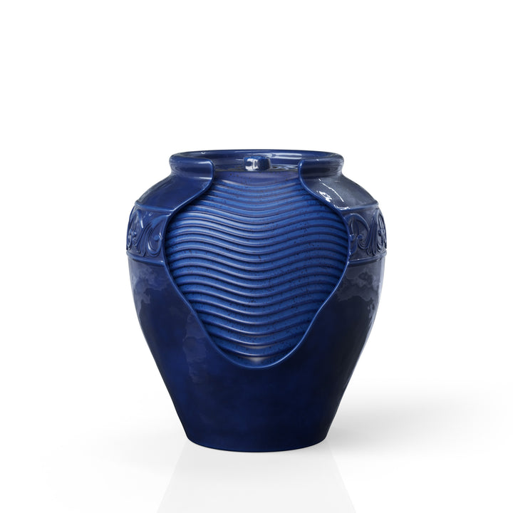 A blue vase shaped water fountain with a exposed surface