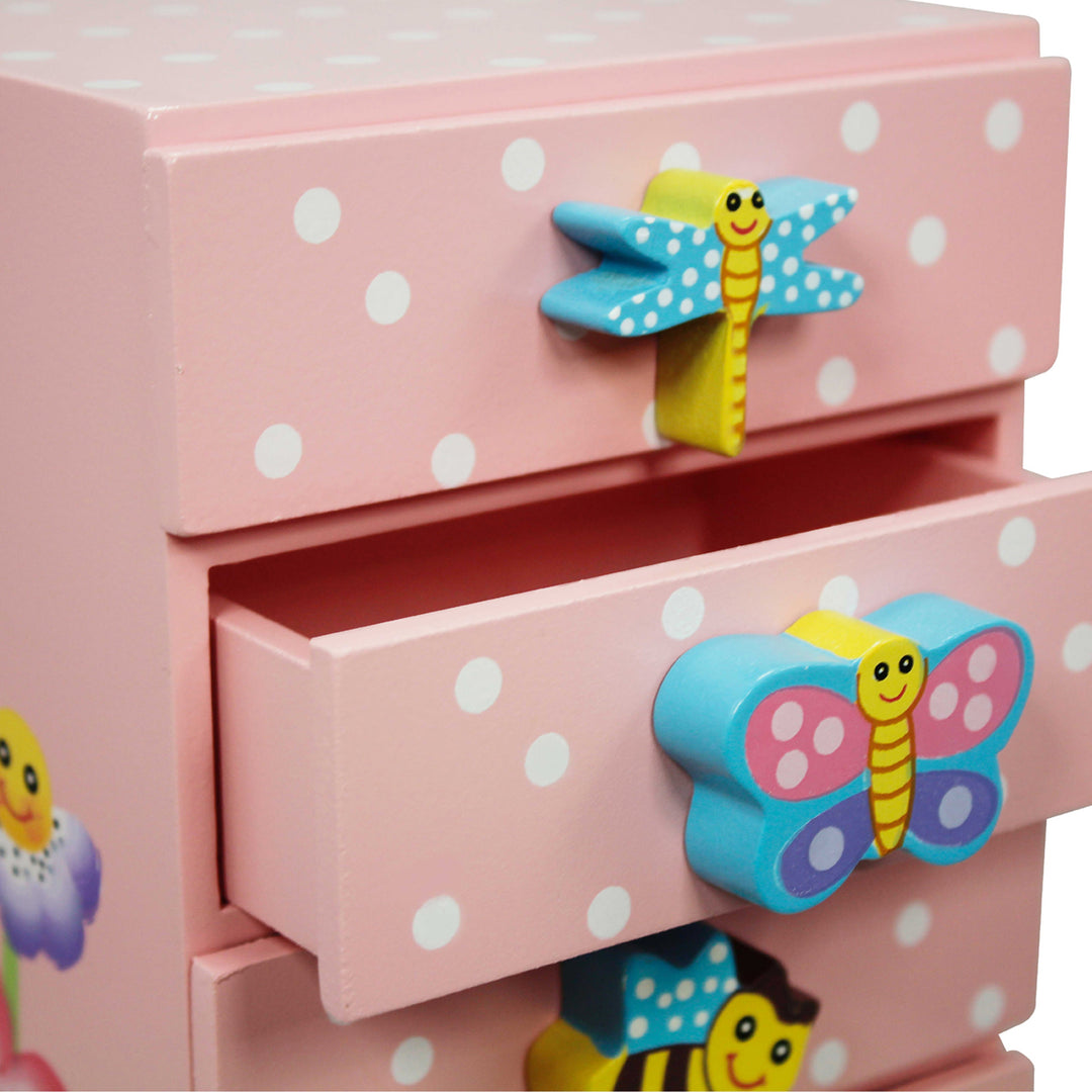 A Fantasy Fields Magic Garden Kids Wooden Trinket Chest, Pink adorned with butterflies and polka dots on it.