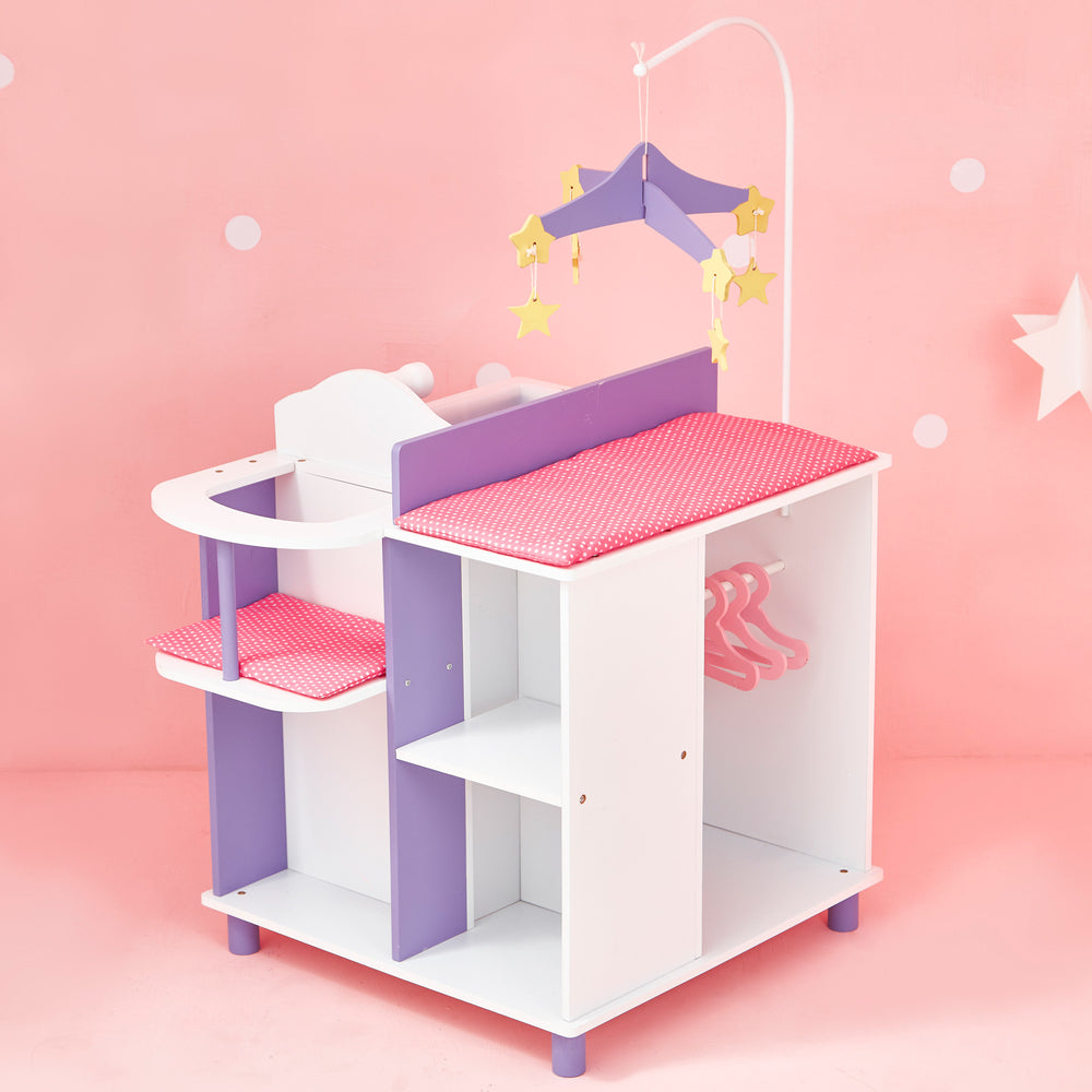 A baby doll changing station in pink, purple, and white with a closet, storage shelves, high chair, mobile, sink, and changing table in a pink room.
