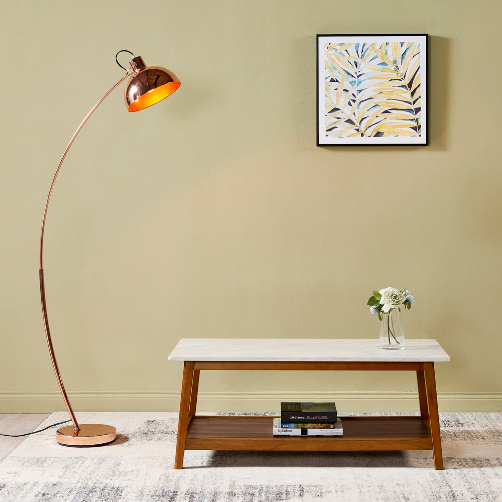 A room with a Teamson Home Kingston Wooden Coffee Table with Storage and Marble-Look Top, Marble/Walnut featuring a durable structure and a floor lamp.