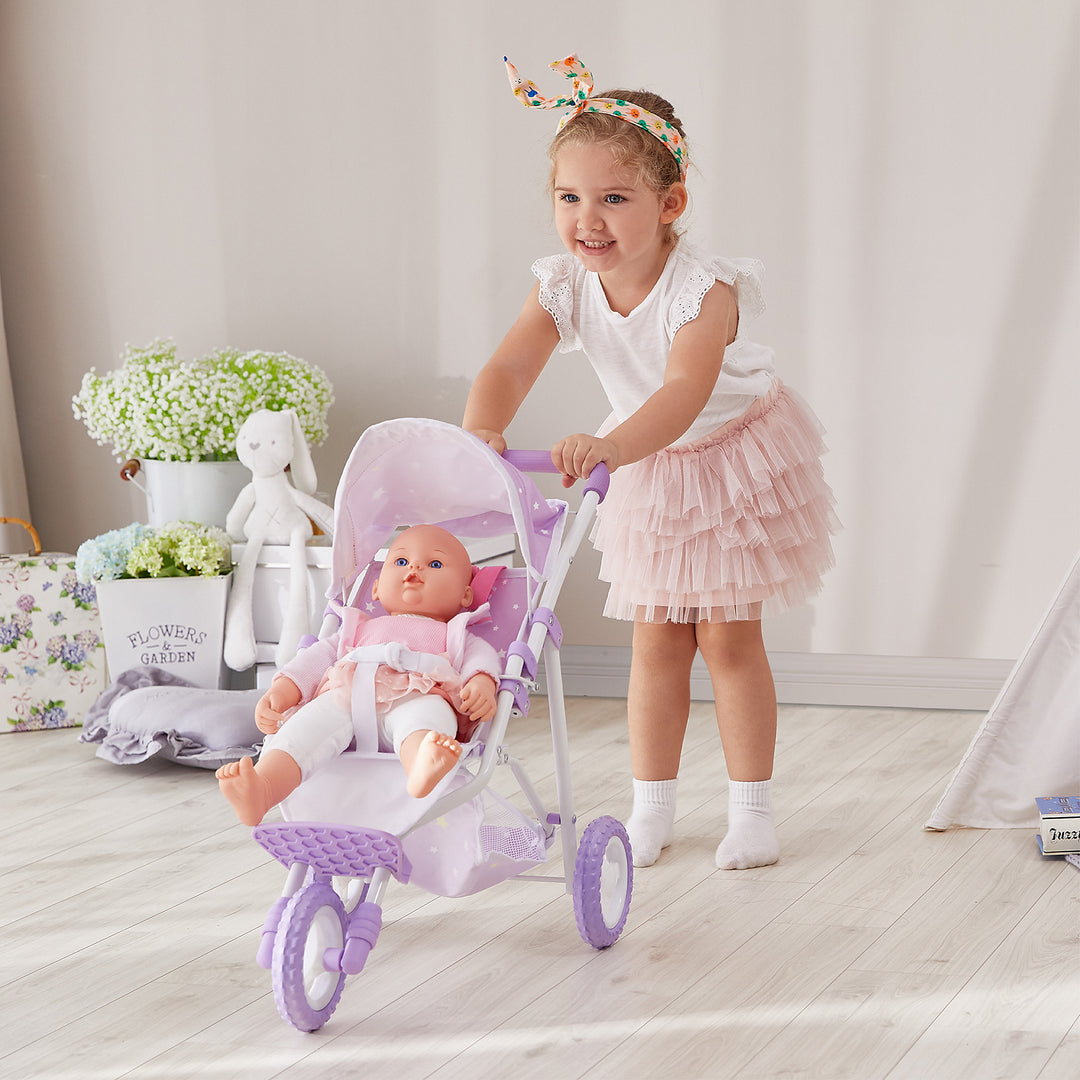 A girl pushing Olivia's Little World Twinkle Stars Doll Jogging Stroller, Purple.