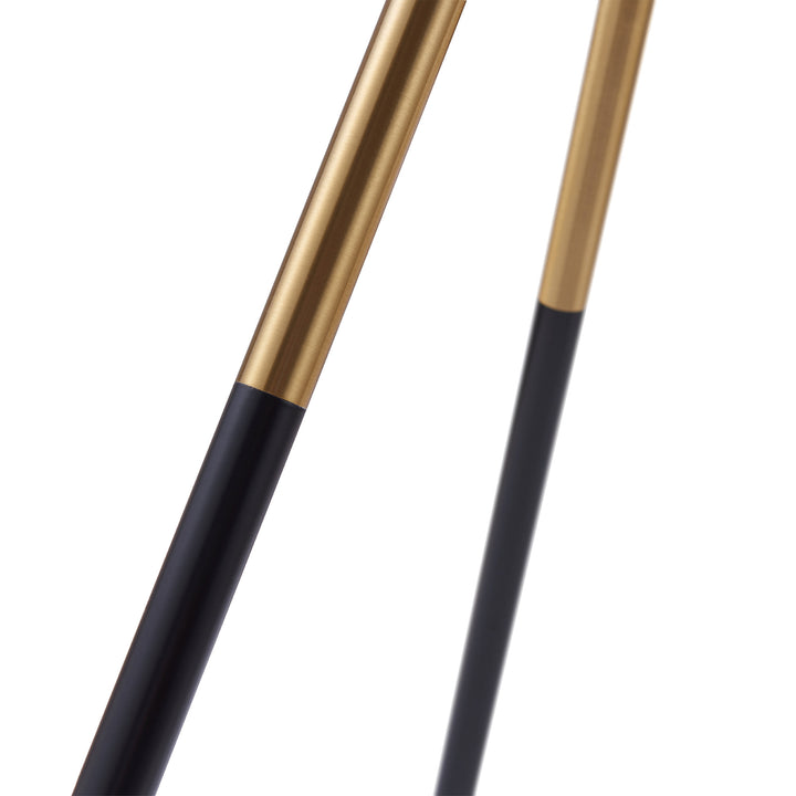 Close-up of the lamp legs, gold with black legs