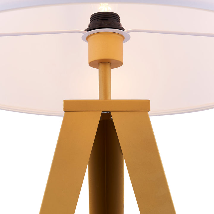 Teamson Home Romanza 62" Postmodern Tripod Floor Lamp with Drum Shade, Matte Gold/White with a round lampshade.