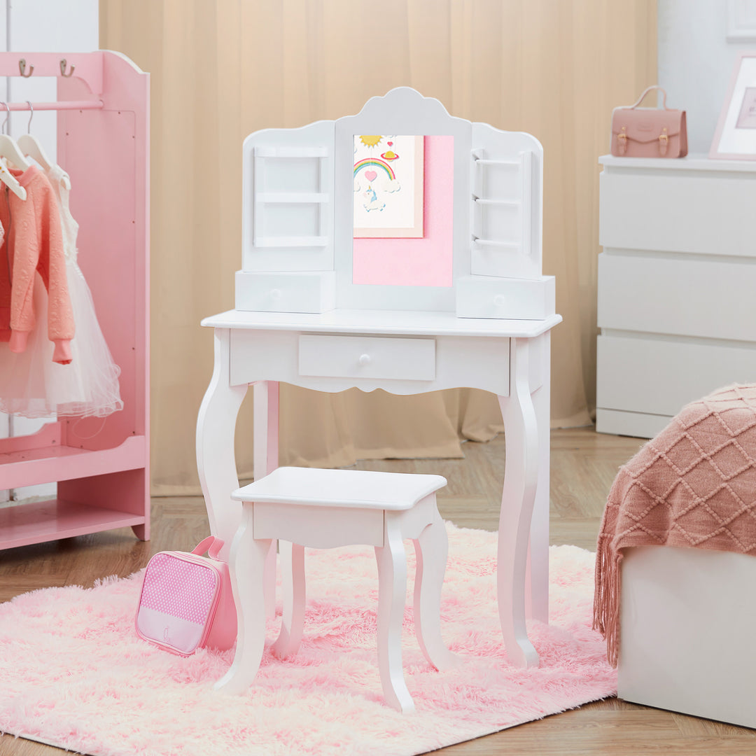 A girl's bedroom with a Fantasy Fields Little Princess Anna Vanity Set with Mirror, Drawers, Jewelry Storage, and Stool.