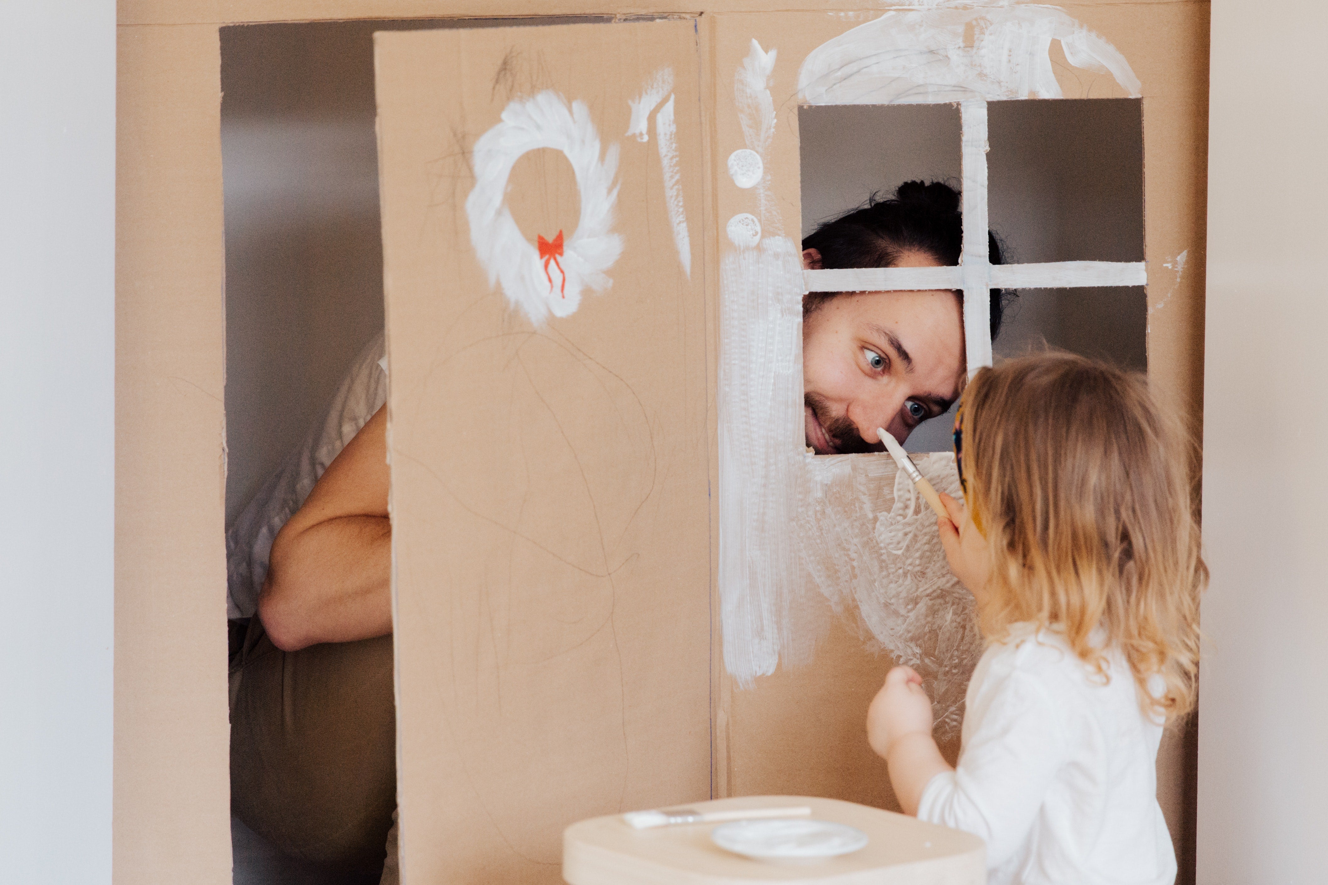 Father's Day Blog Hero Image. Father and daughter painting.