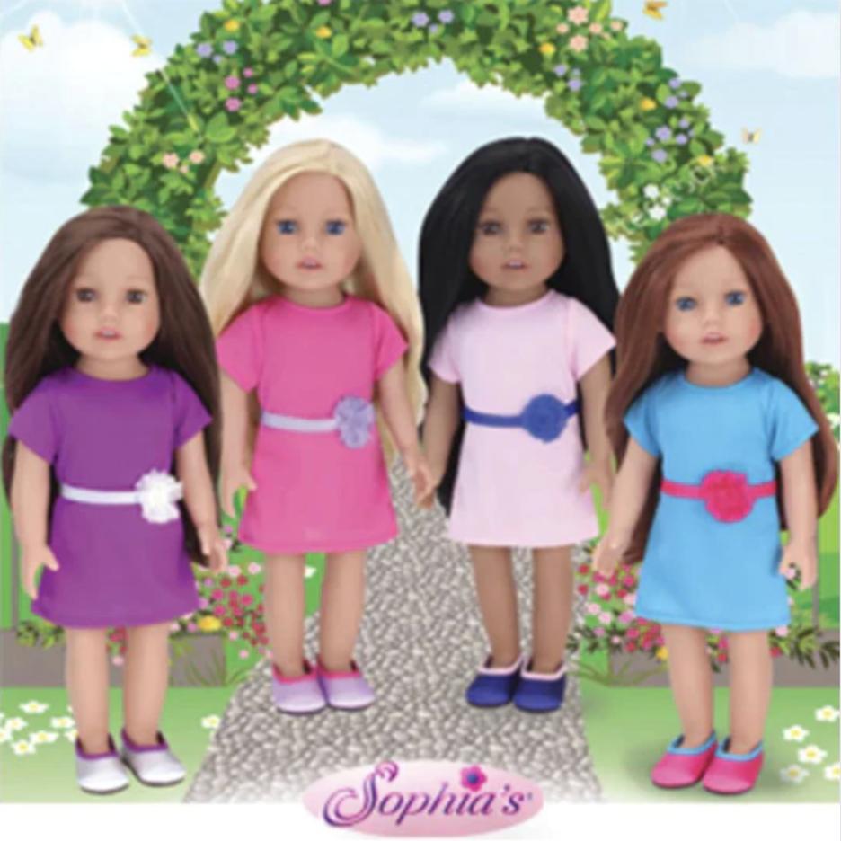Four 18" dolls - a light skinned, brunette doll with a purple dress, a lightskinned blonde doll with a pink dress, a darkerskinned doll with black hair and a pink dress, and an auburn haired doll with a blue dress