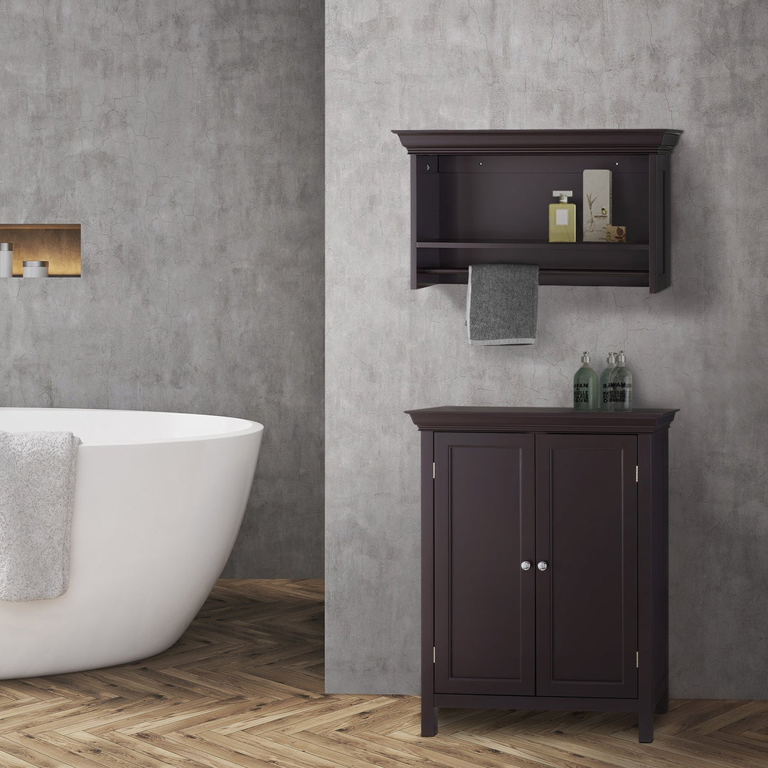 Brown bath furniture storage in a gray bathroom.