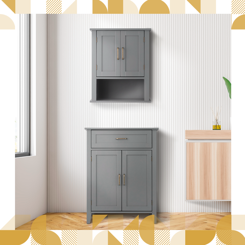 Two gray two-door cabinets - one mounted on the wall and the other a floor cabinet - sit in a white bathroom.