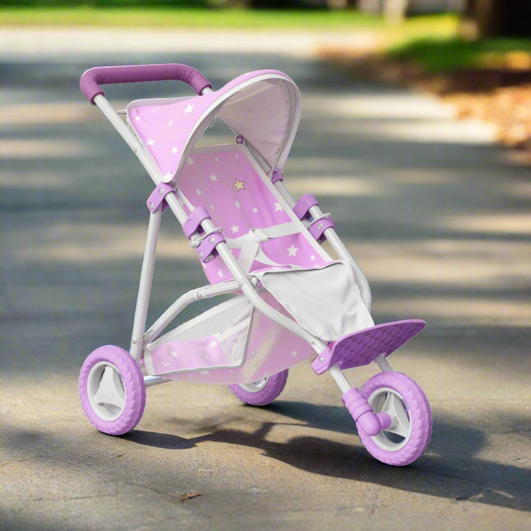 A young girl pushes her realistic purple baby doll stroller