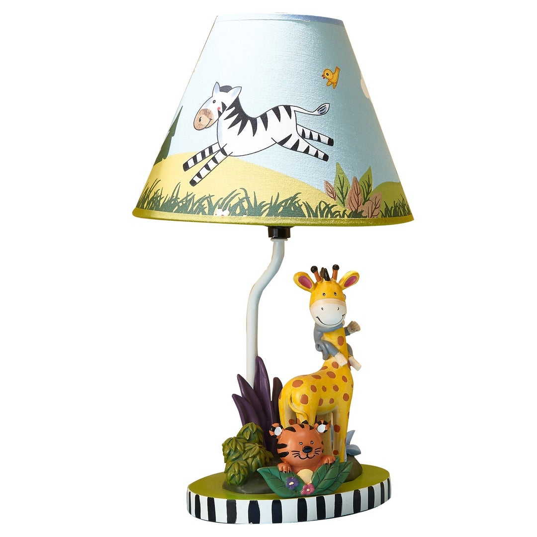 A table lamp with a giraffe and tiger on the base and a zebra on the shade.