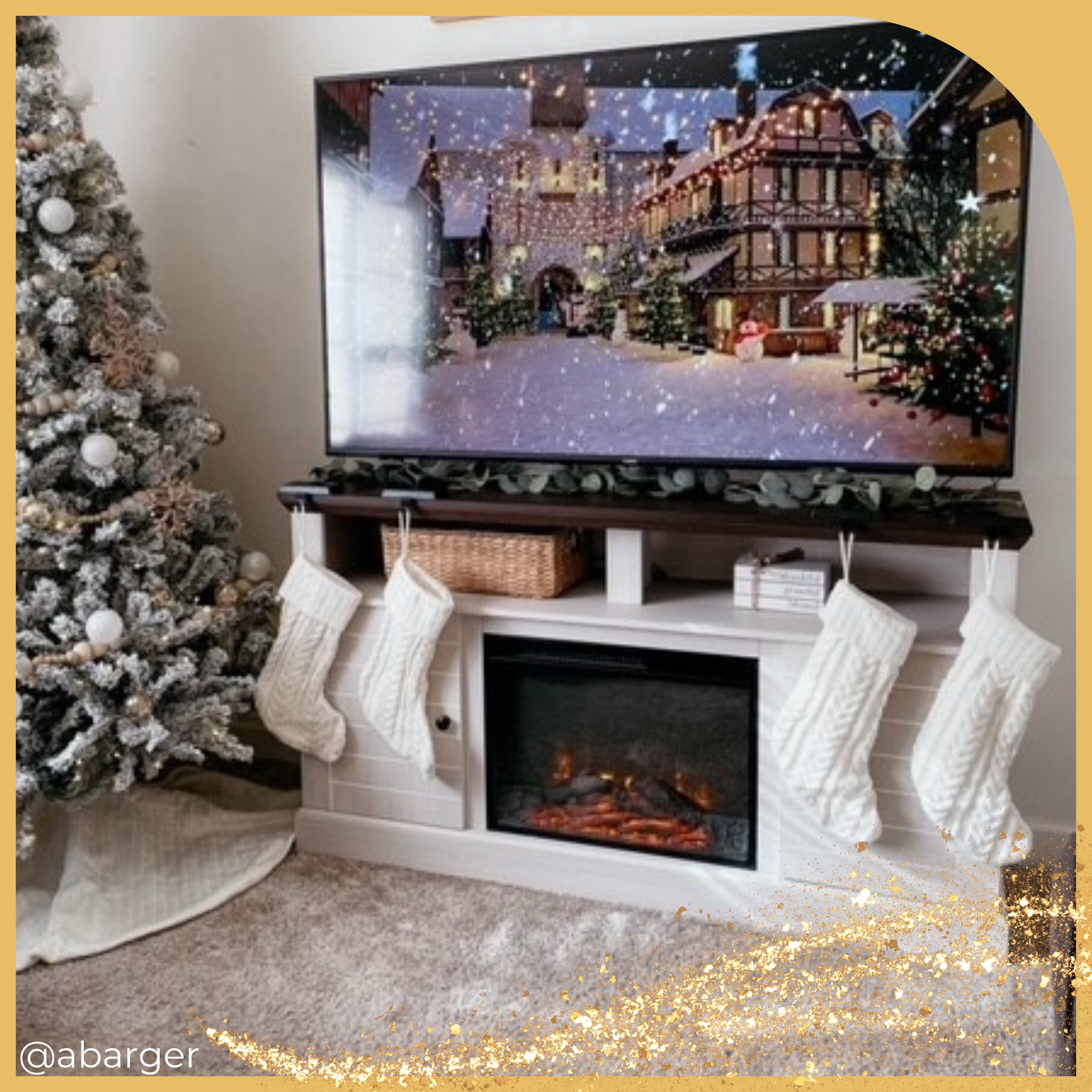 the tv console and electric fireplace is used as a winter holiday mantel with stockings