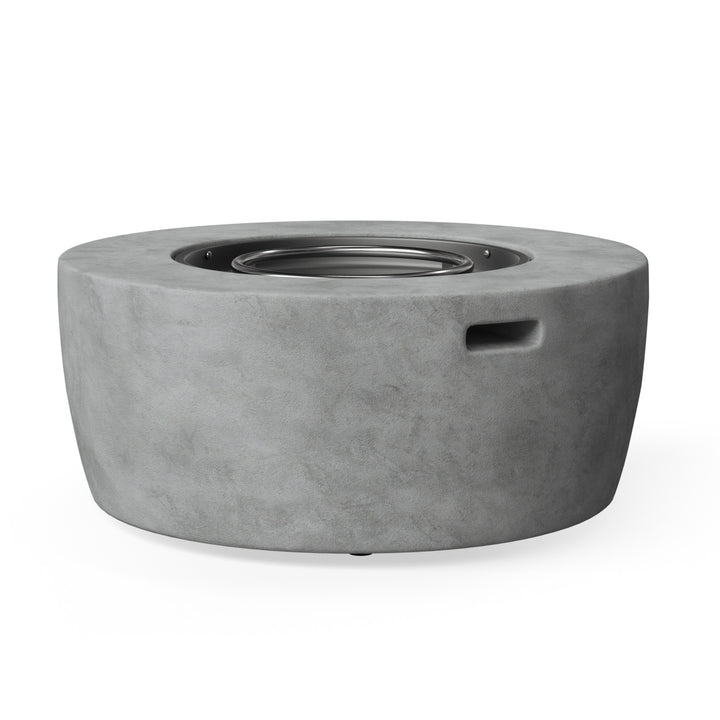 A faux concrete fire pit with a convienent handle slot