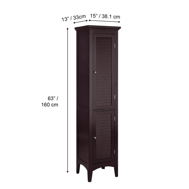 A view of a Dark Brown Teamson Home Glancy Linen Cabinet with louvred doors with dimensions in inches and centimeters