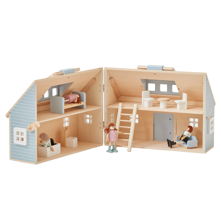An open blue and oak finished cottage dollhouse with a doll laying in a bed in one room, a table with two chairs in the room next to it, a doll standing next to a ladder pointing to a doll sitting on a sofa in the room below, and a doll sitting in a bathtub in the room to the left.