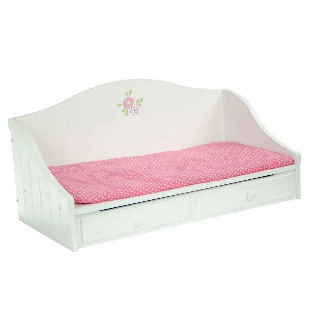 A white trundle bed for 18" dolls with pink bedding with white polka dots.