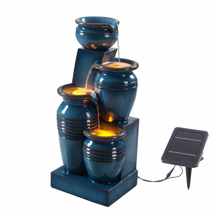 A Teamson Home 28.74" 4-Tier Outdoor Solar Water Fountain with LED Lights, Blue with cascading jars against a white background.