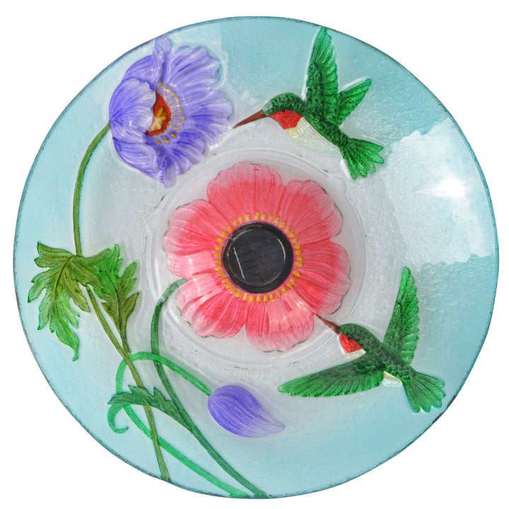 Birdseye view of the glass birdbath bowl featuring hummingbirds and flowers