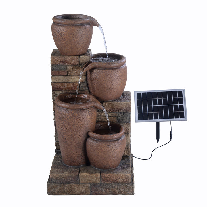 An Teamson Home 30.71" 4-Tier Outdoor Solar Water Fountain with the LED Lights off, but the water flowing