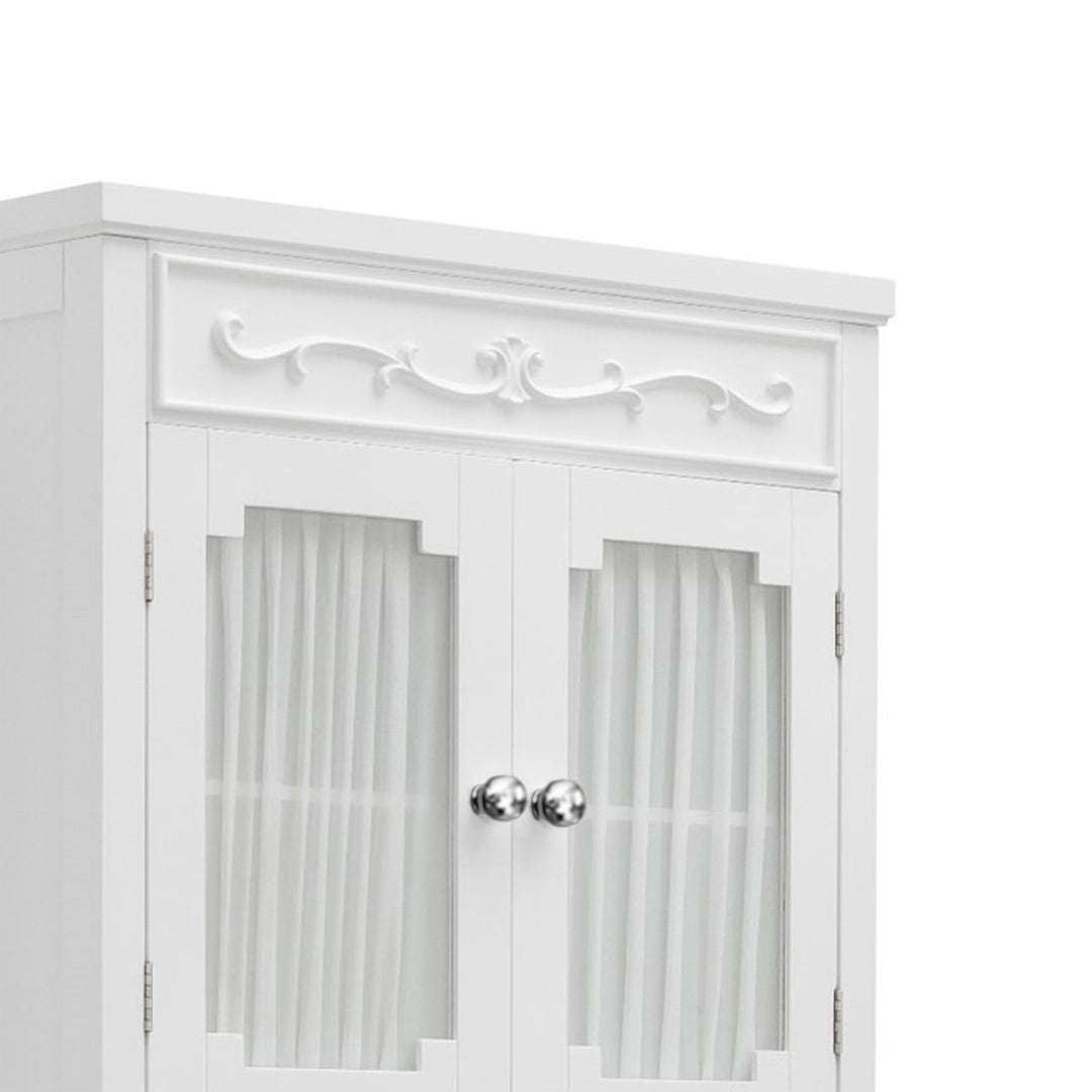 Close-up of the scrolling details on a white over-the-toilet cabinet