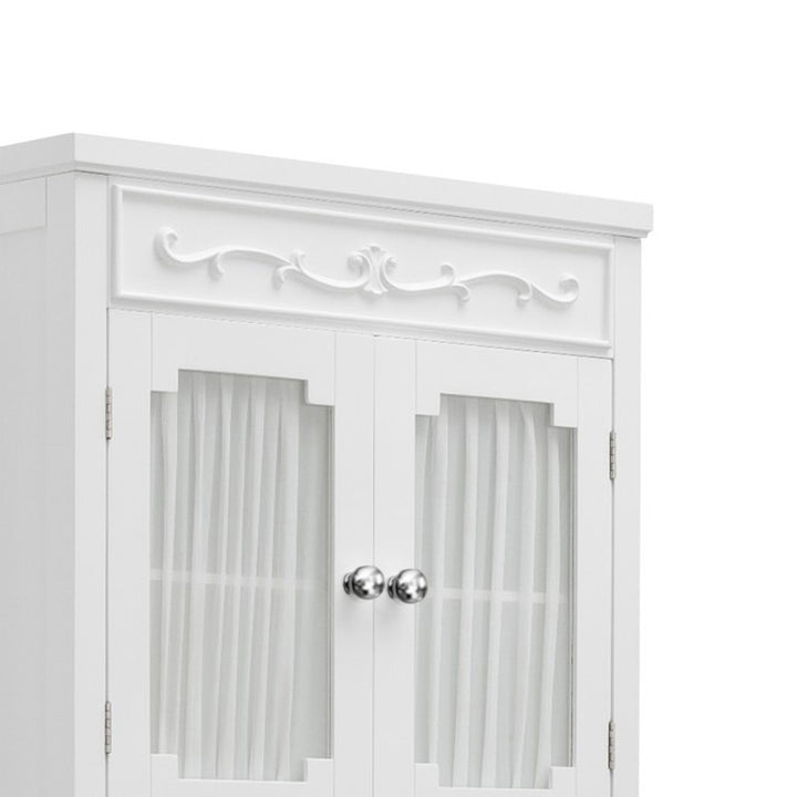 Close-up of the scrolling details on a white over-the-toilet cabinet