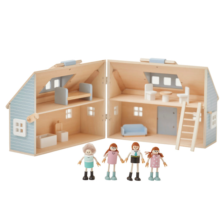An open blue and oak finished cottage dollhouse with four separate rooms with furnishings, and four colorful dolls standing in front.