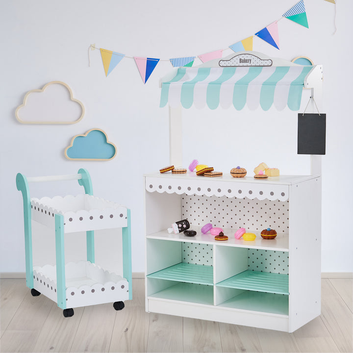 Children's playroom with a Teamson Kids My Dream Bakery Shop, Treat Stand and Dessert Cart