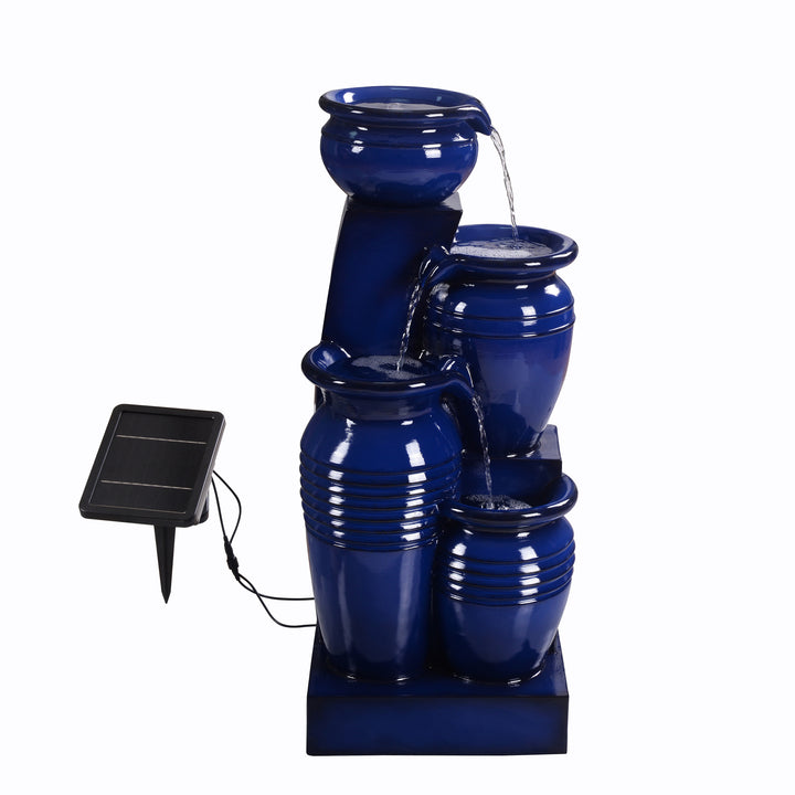 Teamson Home 28.74" Navy Blue 4-Tier Outdoor Solar Water Fountain with the LED Lights off with water falling tier to  tier