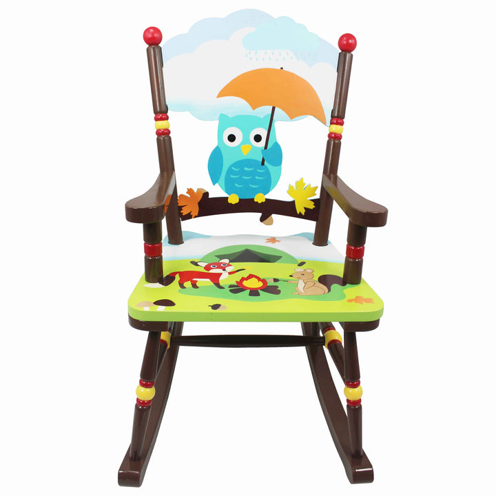 The multicolored Enchanted Woodland  rocking chair featuring a blue owl holding an orange umbrella on the back and a red fox and brown mouse around a campfire on the seat,