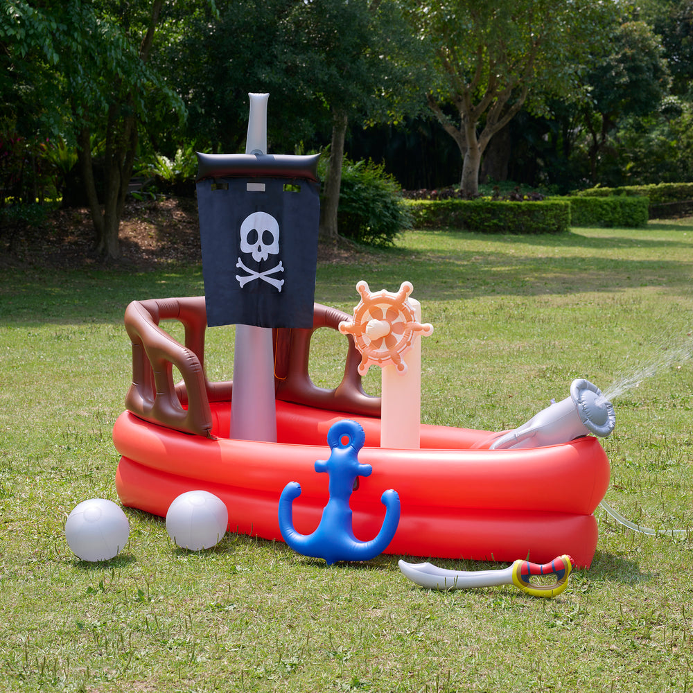 Inflatable pirate ship water play set with spray feature in a garden setting.
Product Name: Teamson Kids - Water Fun Pirate boat Inflatable Sprinkler Play