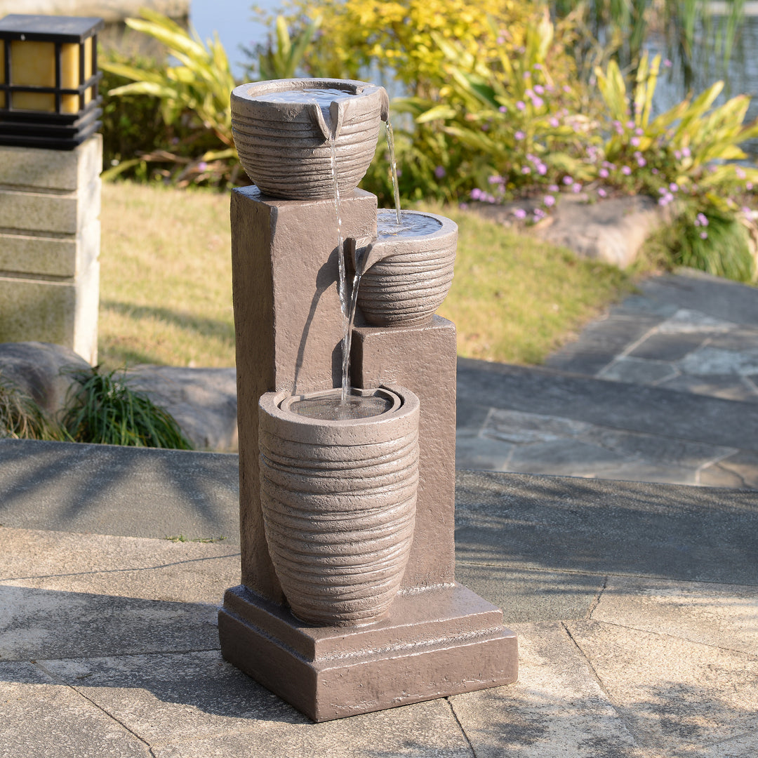 Horizontal Ribbed Pattern Outdoor Water Fountain with Warm Glow Lighting