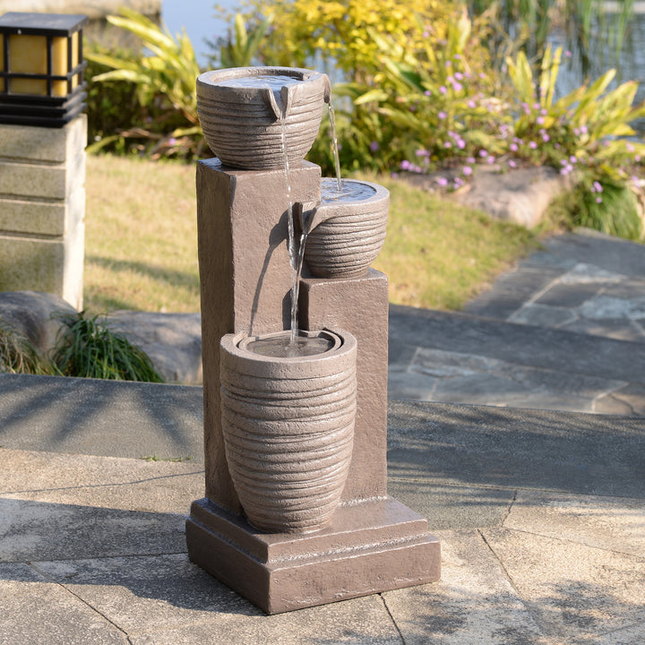 Horizontal Ribbed Pattern Outdoor Water Fountain with Warm Glow Lighting
