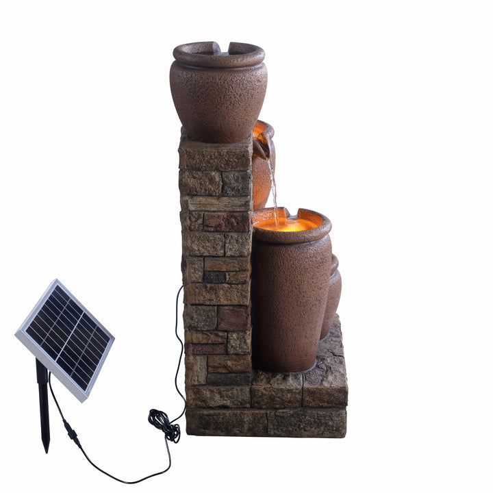  A view from the side of the Teamson Home 30.71" 4-Tier Outdoor Water Fountain with LED Lights, Terracotta design isolated on a white background.