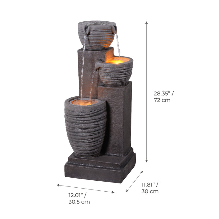 Horizontal Ribbed Pattern Outdoor Water Fountain with Warm Glow Lighting