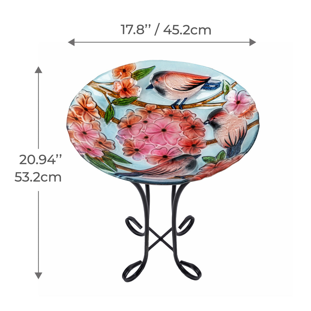 A 17.8" Robins & Blossoms Fusion Glass Birdbath with Metal Stand with the dimensions in inches and centimeters.