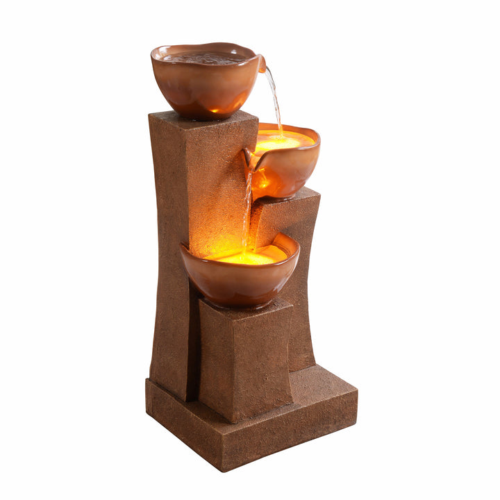 A 28.54" 3-Tier Outdoor Water Fountain with LED Lights, Brown with the lower two tiers illuminated from below