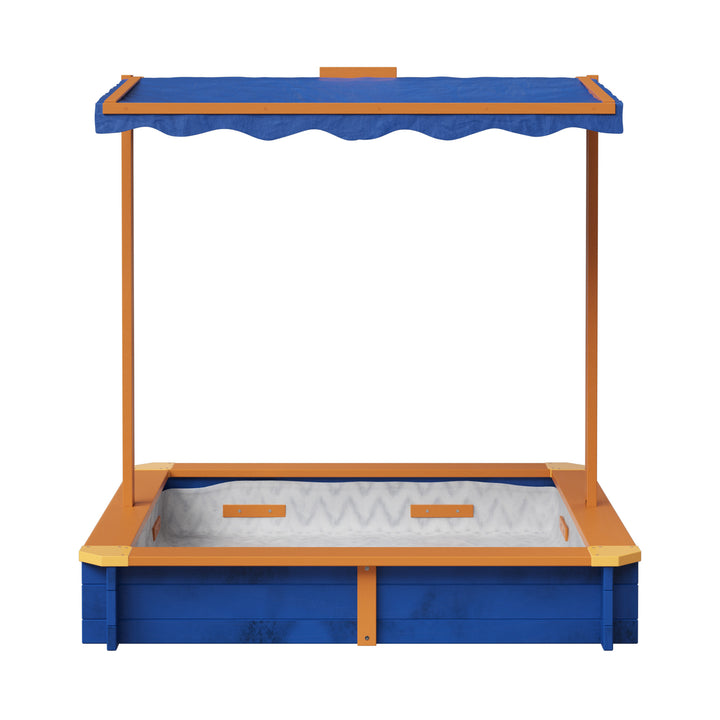 A blue and wood-toned sandbox with a blue awning over it