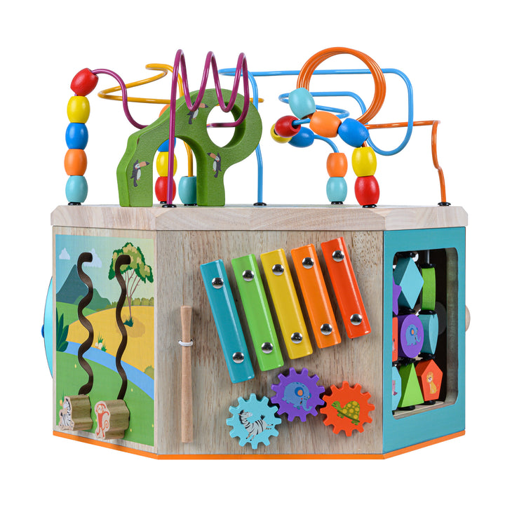 A view of a trio of spinning gears and a xylophone.