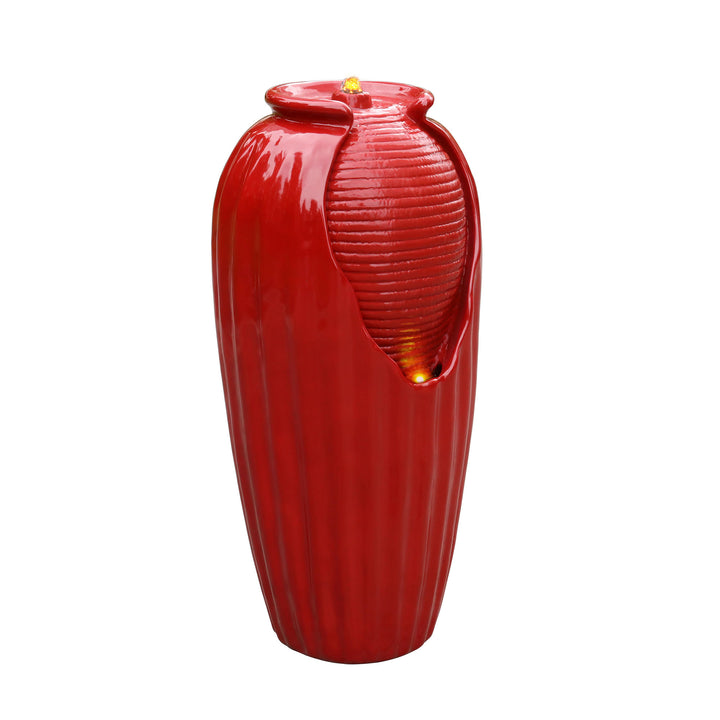 A red ceramic Teamson Home Indoor/Outdoor Contemporary Glazed Contoured Vase Water Fountain with LED lights.