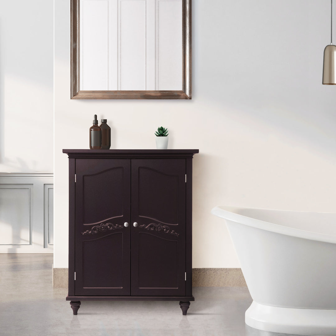 Teamson Home Versailles Dark Espresso Floor Cabinet with ornate detailing in elegant bathroom interior with a classic freestanding bathtub 