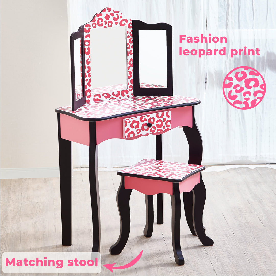 A pink and black Fantasy Fields Gisele Leopard Print Vanity Playset with a leopard print stool.