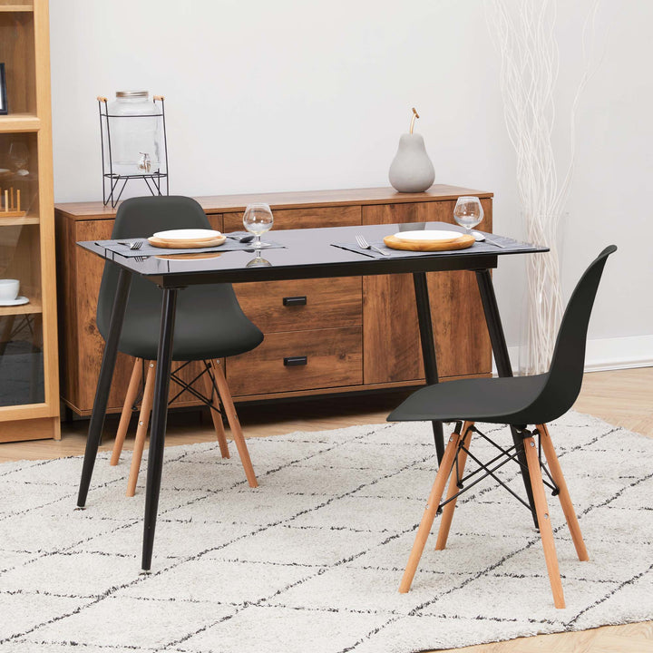 Teamson Home Julianna Reflective Glass Dining Table, Black with a pair of chairs on either side