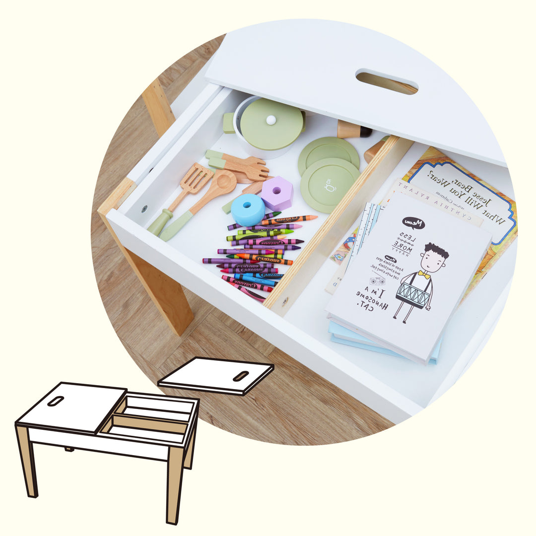 A close-up of the interior of a white child's size table featuring the storage space for toys and books with an illustration in the bottom corner of the removable tabletop.