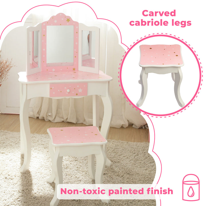 A pink Fantasy Fields Gisele Play Vanity Set with Mirrors, Pink/White with a mirror and stool.