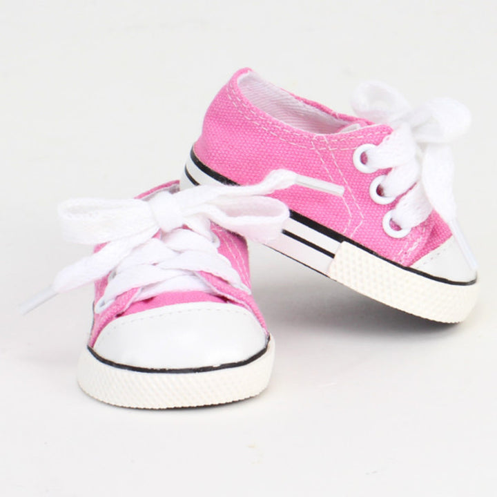 A pair of Sophia’s Light Pink Canvas Sneaker Shoes with Laces for 18" Dolls on a white background.